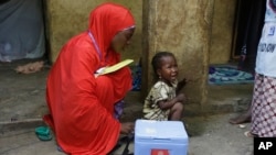 FILE: Illustrative representative of an anti-polio inoculation program, here in Nigeria. Taken Aug. 28, 2016.