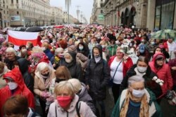 Riot police clashed with protesting pensioners in central Minsk, Belarus, Oct. 12, 2020.