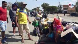 Migrantes venezolanos en frontera con Colombia