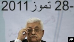 Palestinian President Mahmoud Abbas attends a meeting of the Central Committee of the Palestine Liberation Organization (PLO), in the West Bank city of Ramallah, July 27, 2011