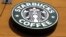 FILE - The Starbucks Coffee logo in Mountain View, California. The company announced in July it would be partnering with Taste Holdings to bring a number of stores to South Africa.