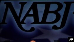 FILE - Former Vice President Joe Biden delvers remarks to the National Association of Black Journalists at their annual convention in New Orleans, June 20, 2012.