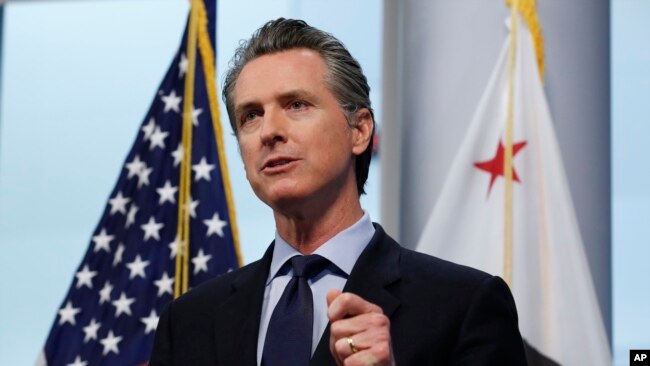 In this April 9, 2020 photo, Gov. Gavin Newsom gives his coronavirus update. The governor said California plans to spend $1 billion to buy 500 million masks with the idea of distributing them throughout the western U.S.