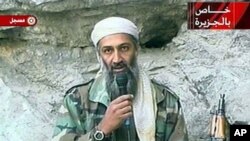 This image made from video broadcast on 07 Oct 2001 shows Osama bin Laden at an undisclosed location