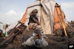 Sarah Bagheni, in the Bulengo refugee camp in Goma, DRC, says she suspects she may be infected with mpox on Aug. 16, 2024, one day after the World Health Organization declared the increasing spread of mpox in Africa a global health emergency.