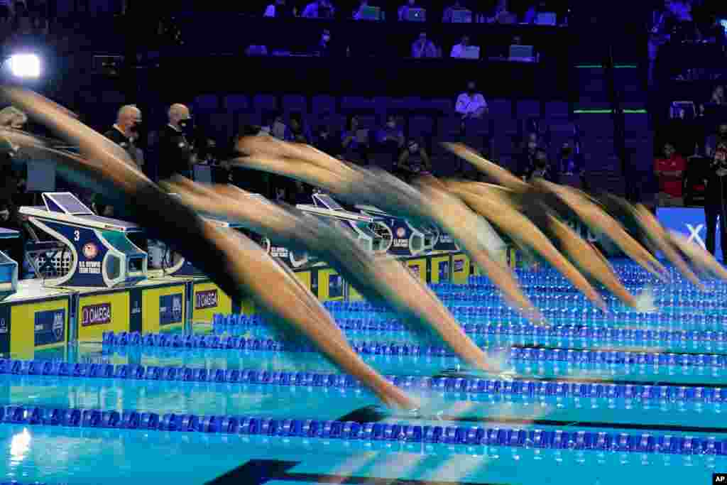 Swimmers start in the women&#39;s 200 butterfly during wave 2 of the U.S. Olympic Swim Trials, June 16, 2021, in Omaha, Nebraska.