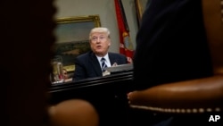 President Donald Trump speaks during a meeting with parents and teachers, Feb. 14, 2017, in the Roosevelt Room of the White House in Washington. Alarming health professionals, Trump keeps linking vaccines to autism, despite the theory having been debunked in studies.