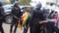 Zimbabwe police detain women protesting against woman trafficking.