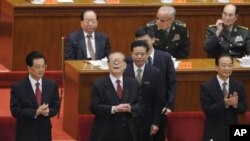 China's President Hu Jintao (L), former President Jiang Zemin (C) and Premier Wen Jiabao (R) attend the commemoration of the 100th anniversary of the Xinhai Revolution at the Great Hall of the People in Beijing, October 9, 2011.