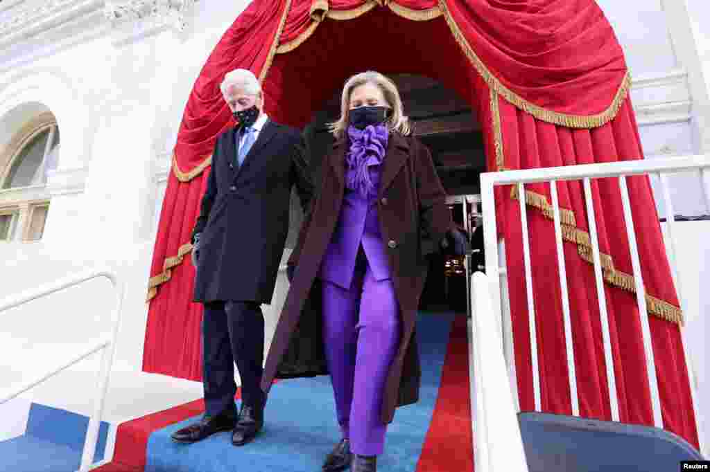 Former U.S. President Bill Clinton and his wife Hillary Clinton arrive before the inauguration of Joe Biden as the 46th President of the United States on the West Front of the U.S. Capitol.