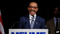 Democrat Kweisi Mfume reacts while speaking to reporters during an election night news conference after he won the 7th Congressional District special election, April 28, 2020, in Baltimore.