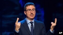 FILE - John Oliver speaks in New York, Feb. 28, 2015.