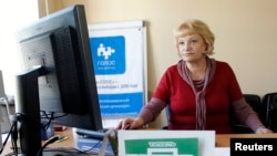 Liliya Shibanova, leader of Russian election watchdog Golos, works at her office in Moscow, Russia, Sep. 19, 2012.