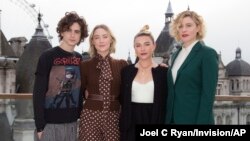 FILE - From left, actors Timothee Chalamet, Saoirse Ronan, Florence Pugh and director Greta Gerwig are pictured at the photo call for "Little Women" in London, Dec. 16, 2019.