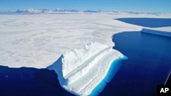 FILE - The frigid Antarctic region is an expanse of white ice and blue waters, as pictured in March 2017, at the U.S. research facility McMurdo Station.