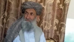 FILE - Mullah Hassan Akhund is seen in an undated photo released by the Taliban’s media team.