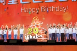 FILE - Jack Ma attends Alibaba's 20th anniversary party at a stadium in Hangzhou, Zhejiang province, China, Sept. 10, 2019.