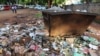 In Mbare township, the “epicenter” of the current typhoid outbreak, sewer water flows and refuse has gone for days without being collected in Harare, Zimbabwe, Jan. 5, 2017. (Photo: S.Mhofu/VOA)