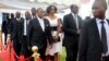Retired general Constantino Chiwenga and Defense Minister Kembo Mohadi arrive at the State House to take oaths of office as Zimbabwe's vice presidents, Harare, Dec. 28, 2017.
