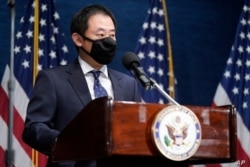 Xiyue Wang, un chino-estadounidense que fue detenido por Irán de 2016 a 2019, habla en el National Press Club en Washington, el 12 de enero de 2021. (AP foto/Andrew Harnik/Pool)