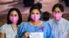 Philippines' Vice President Leni Robredo poses with her daughters Aika and Tricia after filing her certificate of candidacy for president in the 2022 national election, in Pasay City, Metro Manila, Philippines, Oct. 7, 2021. (Ezra Acaya/Pool via Reuters) 