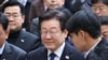 South Korea's main opposition Democratic Party leader Lee Jae-myung arrives at a court in Seoul on November 25, 2024.