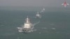 En la imagen, tomada de un video del Servicio de Prensa del Ministerio de Defensa Ruso del 22 de diciembre de 2022, buques de guerra chinos participan en maniobras navales conjuntas con Rusia en el Mar de China Oriental. 