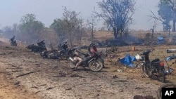 This photo provided by the Kyunhla Activists Group shows aftermath of an airstrike in Pazigyi village in Sagaing Region's Kanbalu Township, Myanmar, April 11, 2023.