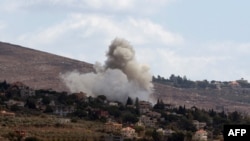 Smoke billows from the site of an Israeli airstrike that targeted an area in the southern Lebanese village of al-Taybeh on September 19, 2024.