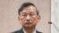 台湾法务部次长 陈明堂在立法院接受质询(美国之音张永泰拍摄)