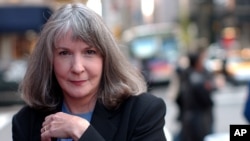 FILE - Sue Grafton is pictured in New York, Oct. 15, 2002. The mystery writer has died in Santa Barbara, Calif., at age 77. 