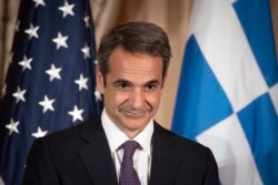 FILE - Greek Prime Minister Kyriakos Mitsotakis appears at a reception, at the State Department in Washington, Jan. 8, 2020.