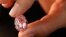 FILE - "The Spirit of the Rose" is a 14.83-carat vivid purple-pink diamond. It sold at auction Nov. 11, 2020, in Geneva for $26.6 million.