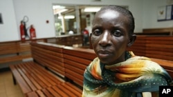 Jolly Nyamigisha, 40, a Ugandan woman living with HIV/AIDS waits to receive antiretroviral drugs from the Infectious Disease Institute (IDI) at the Uganda referral hospital, Mulago, near the capital Kampala, (File).