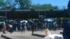 Commuters stranded at Bulawayo's local bus and commuter omnibus terminus. (Photo: Taurai Shava)