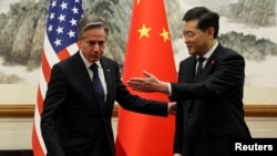 آنتونی بلینکن و چین گانگ، وزیران امور خارجه ایالات متحده و چین 