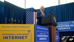 FILE - President Joe Biden speaks in Raleigh, N.C., Jan. 18, 2024. The White House is pressing Congress to extend the Affordable Connectivity Program, set to expire this month. About 329,500 tribal households are currently enrolled in the plan.