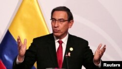 FILE - Peru's President Martin Vizcarra speaks in Lima, Peru, July 6, 2019.