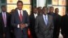 FILE - Zambian President Edgar Lungu (L) and Zimbabwean President Robert Mugabe are seen walking after a meeting at State House in Harare, Zimbabwe, Feb. 6, 2015.
