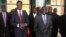 FILE - Zambian President Edgar Lungu (L) and Zimbabwean President Robert Mugabe are seen walking after a meeting at State House in Harare, Zimbabwe, Feb. 6, 2015.