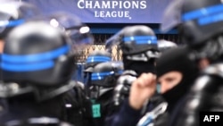 FILE - Riot police stand inside the stadium prior to a Champions League match in Paris on Dec. 11, 2019. Security will be "considerably reinforced" at the April 10, 2024, Champions League match after an Islamic State threat, the French interior minister said.