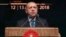 Turkey's President Recep Tayyip Erdogan delivers a speech in Ankara, Turkey, Dec. 12, 2018. Erdogan said Turkey will begin "within a few days" a new military operation to drive out U.S.-backed Syrian Kurdish fighters in Syria, east of the Euphrates River.