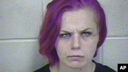 Brittany Mugrauer was arrested after her children were found living in a wooden shipping crate in a cave on the eastern edge of Kansas City, Missouri.