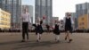 FILE - Pupils celebrate the beginning of a new school year during a ceremony marking Knowledge Day at a newly opened school in Saint Petersburg, Russia, Sept. 2, 2024.