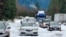 In this photo provided by Caltrans, are cars and trucks in stopped traffic on Interstate 5 near Dunsmuir, Calif., Nov. 27, 2019.