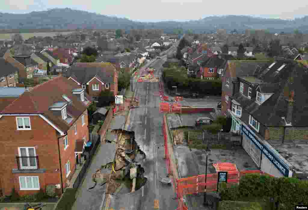 A drone view shows a large sinkhole in Godstone, southern Britain.