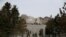 A woman walks at the Mount Rushmore National Memorial as the spread of the coronavirus disease (COVID-19) continues in South Dakota.