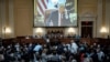 En una pantalla se muestra un video del ex vicepresidente Mike Pence hablando ante la Sociedad Federalista. El comité selecto de la Cámara que investiga el ataque al Capitolio del 6 de enero de 2021 celebra una audiencia en el Capitolio en Washington el 16 de junio de 2022.