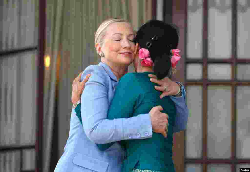 U.S. Secretary of State Hillary Clinton hugs Myanmar's pro-democracy leader Aung San Suu Kyi as they meet in Yangon December 2, 2011. (Reuters)