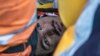 Рятувальники витягують з під-завалів 23-річного Хусейна Сефероглу у місті Антакія через майже тиждень після потужного землетрусу на півдні Туреччини. 12 лютого 2023. AP Photo/Petros Giannakouris